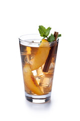 Refreshing peach iced tea in glass with ice cubes and cinnamon isolated on white background