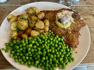 Traditional Wiener Schnitzel with Peas and Roasted Potatoes