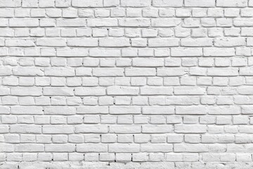 White painted brick wall with a clean, minimalistic texture and even pattern, suitable for backgrounds or design projects