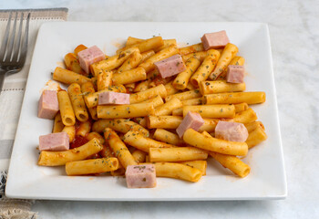 ziti  top with  spam and herbs