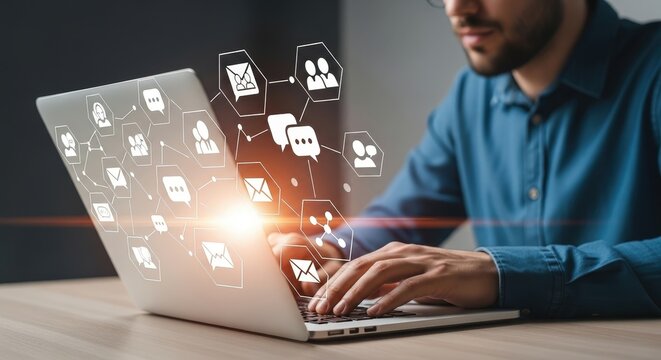 Man typing on a silver laptop with overlaid digital communication icons, representing online messaging