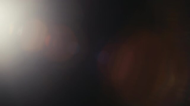 Abstract Light Flare Overlay &ndash; Real Canon glass artifacts with subtle bloom for cinematic mood enhancement.