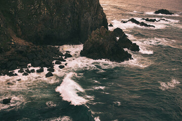 Obraz premium Rough Atlantic waves crashing against rocks on the coast of Galicia, Spain
