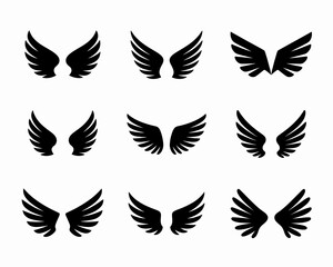 Obraz premium Collection of nine black wing silhouettes isolated on white background