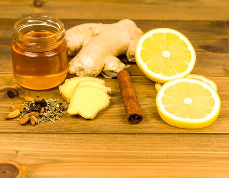 Natural remedy ingredients on a wooden table