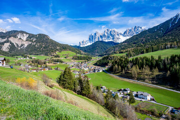 iconic santa maddalena church create a picturesque scene with the odle mountains in the background