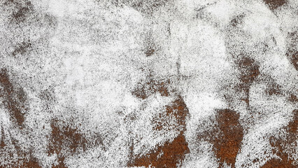 Gold wall painted with white paint.