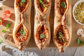 Tasty fruste Margherita made of tomatoes, basil and cheese.