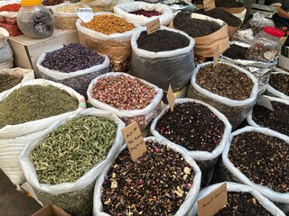 Assortment of the tea and herbs in sacks on the market in Baku, Azerbajan