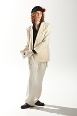 Handsome young man showcases bold fashion choices in a stylish urban setting