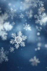 Falling snowflakes against a deep blue background
