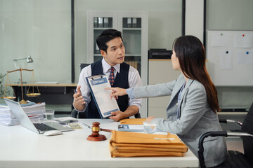Fototapeta premium Business people and lawyers discussing contract papers sitting in the table at office in the morning. concepts of law, advice, legal services.