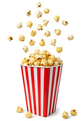 bucket of popcorn, Popcorn flying out of red white striped paper box isolated on white, transparent background, PNG, with copy space. Splash, levitation of popcorn grains., box of popcorn