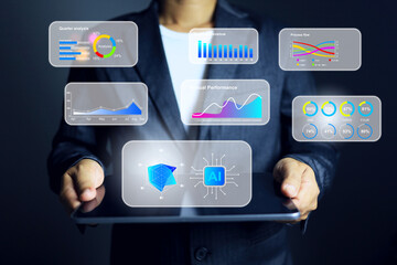 data analysis concept with businessman holding tablet virtual interface floating around represent to data analytics and summary for presentation on chart format