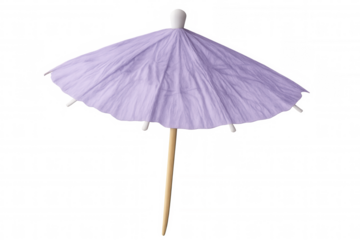 Miniature purple cocktail parasol resting against white backdrop, lending decorative flair to tropical drink presentation