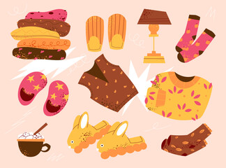 Cozy autumn set with folded sweaters, fluffy slippers, knitted socks, and hot cocoa. Perfect for seasonal design, home decor, greeting cards, and cozy lifestyle concepts