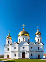 white Church with five domes with Golden crosses and blue sky