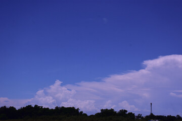 Vast Deep Blue Sky Over a Dark Horizon Line