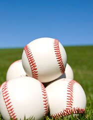 Baseball pile on grass