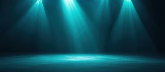 Teal spotlight beams on dark floor.