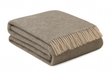 Soft folded blanket featuring textured fringe, lending warmth and comfort against transparent backdrop