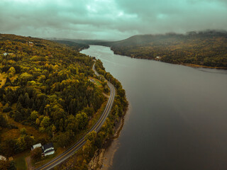 winding road through the forest . View from top of a cliff. Nova scotia canada.