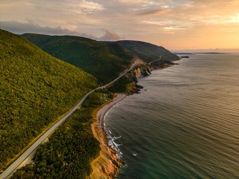 winding road through the forest . View from top of a cliff. Nova scotia canada.