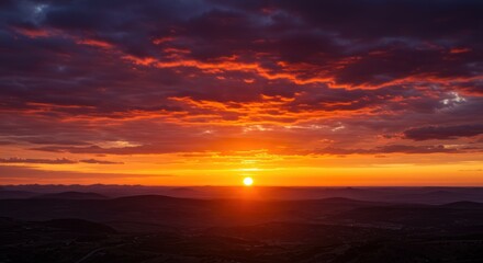 Fototapeta premium Dramatic sunrise landscape with mountains and colorful clouds