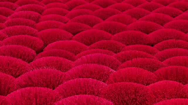 Traditional aroma red incense stick production in vietnamese village, aerial view.