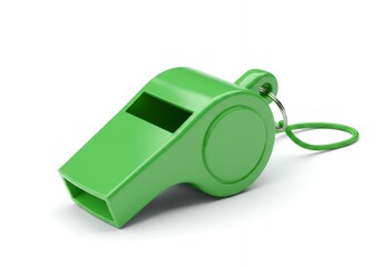 Green plastic sports whistle with matching green cord lanyard on white background, referee equipment for athletic training