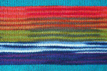 Obraz premium Beautiful Texture and Pattern of Turquoise Blue with Colorful Striped Alpaca Knitted Wool Fabric