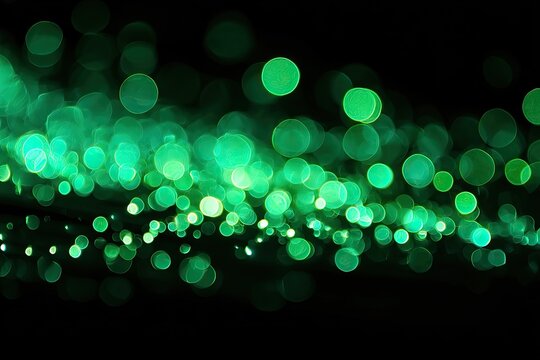 Abstract bokeh background of vibrant emerald green circles