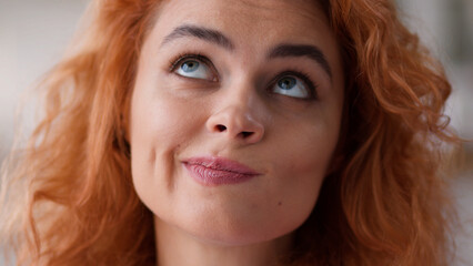 Close up Caucasian woman face pensive dreaming thinking thoughtful girl portrait lady pondering...