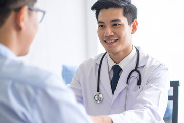 Fototapeta premium Professional medical team with doctors and nurses in a hospital setting, caring for patients