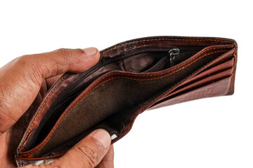 Male hand opening and empty brown leather wallet on white background, bankruptcy and poverty concept.