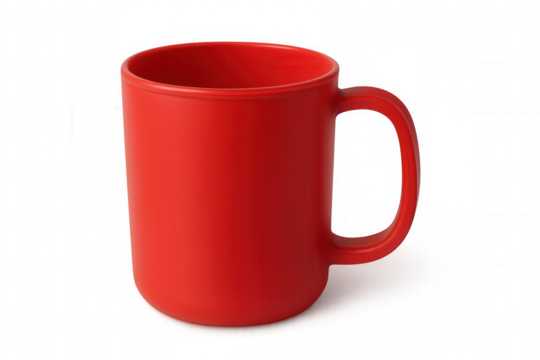 Red ceramic mug sitting vacant on clear surface, highlighting minimalist design potential with bold crimson tone