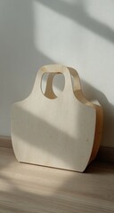 Light beige wooden tote bag, sunlit, minimalist style