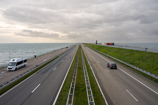 The Afsluitdijk is a major dam and causeway in the Netherlands. It is a fundamental part of the larger Zuiderzee Works, damming off salt water of the North Sea, and turning it into a freshwater lake