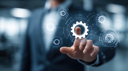 Businessperson interacting with digital gears