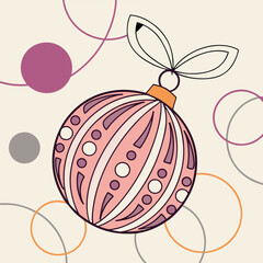 A pink christmas ornament with white and purple details on a colorful background