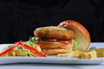 Home made burger with lettuce and cheese