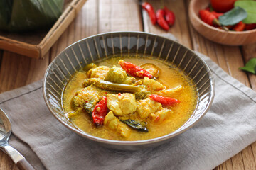 Ayam garang asem. Chicken with sour and spicy soup. perfect for recipe, article, or any commercial purposes.