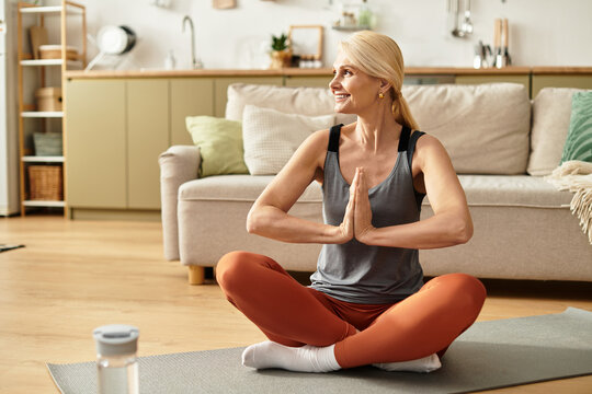 Embracing tranquility in a cozy living room during a peaceful yoga practice