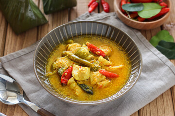 Ayam garang asem. Chicken with sour and spicy soup. perfect for recipe, article, or any commercial purposes.