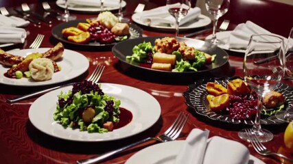 Elegant banquet table set with a variety of gourmet dishes for a fine dining experience, showcasing culinary artistry and sophisticated presentation