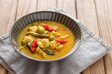 Ayam garang asem. Chicken with sour and spicy soup. perfect for recipe, article, or any commercial purposes.