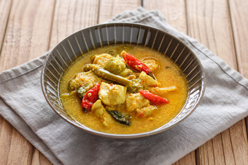 Ayam garang asem. Chicken with sour and spicy soup. perfect for recipe, article, or any commercial purposes.