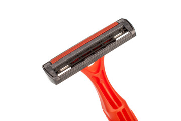 Disposable razor isolated on white background, close-up.