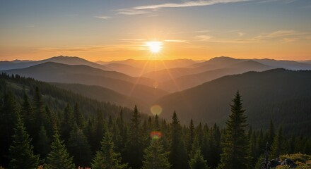 Breathtaking sunrise over layered mountain ranges with golden sun rays piercing through misty atmosphere above dense evergreen forest landscape