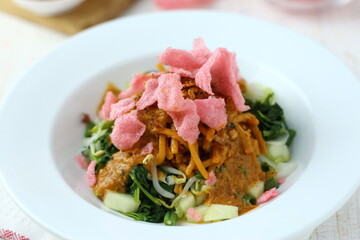 Mie pecel medan. Noodle with peanut sauce and boiled vegetables originated from North Sumatera, Indonesia.